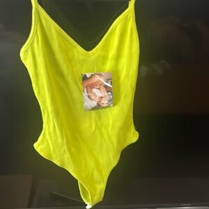 Naked wardrobe neon green bodysuit